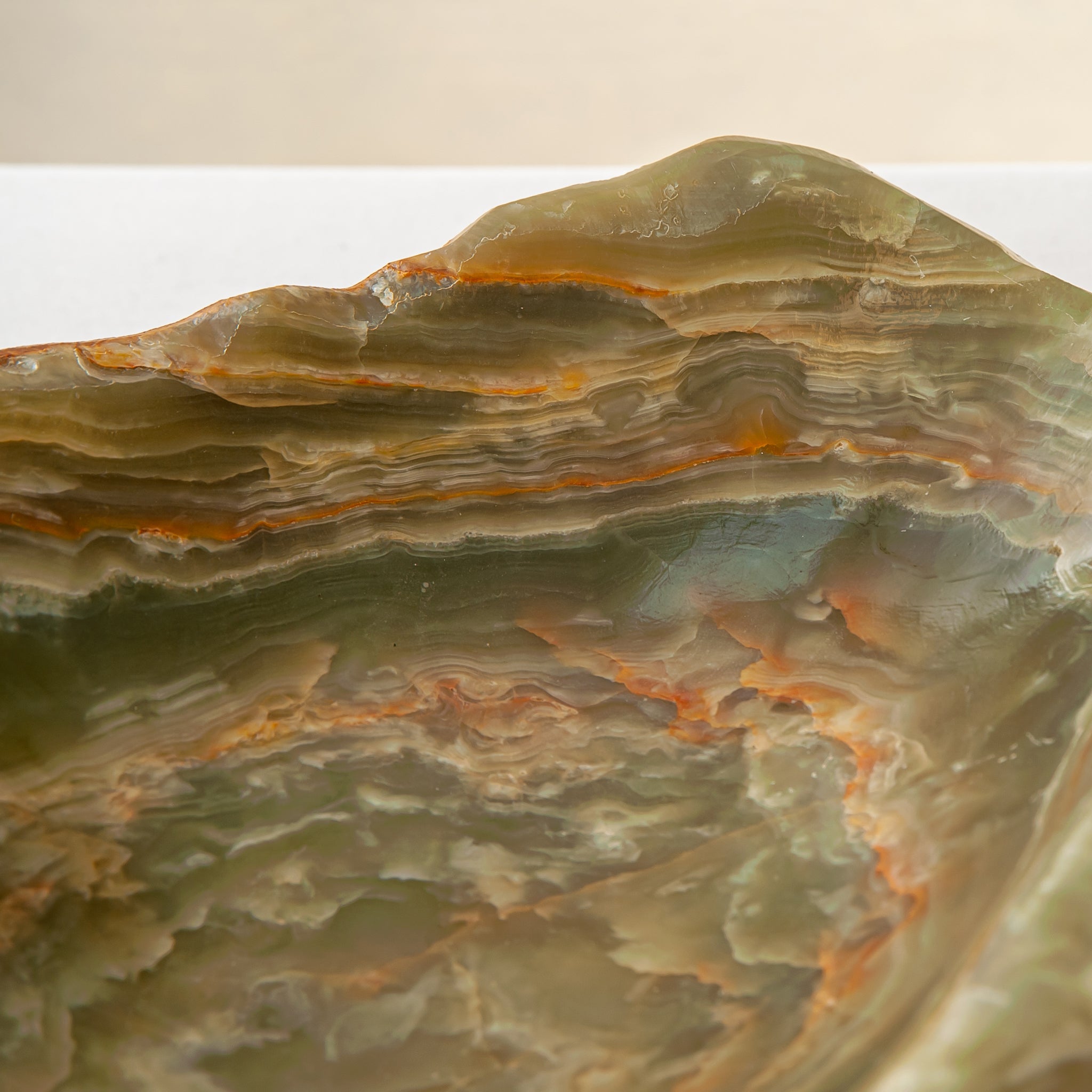 handcrafted onyx bowl with warm amber tones and natural veining for luxury table decor
