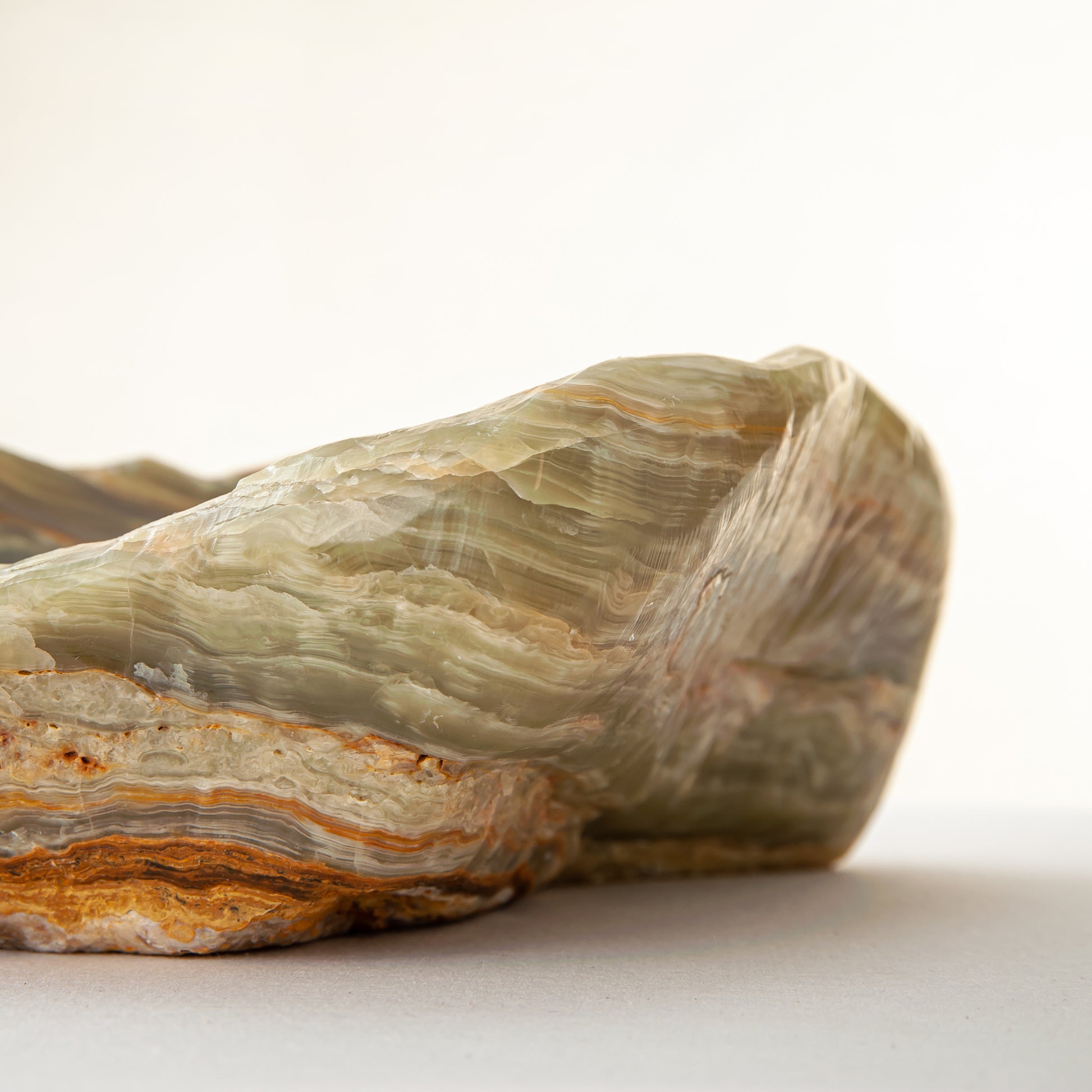 handcrafted onyx bowl with warm amber tones and natural veining for luxury table decor
