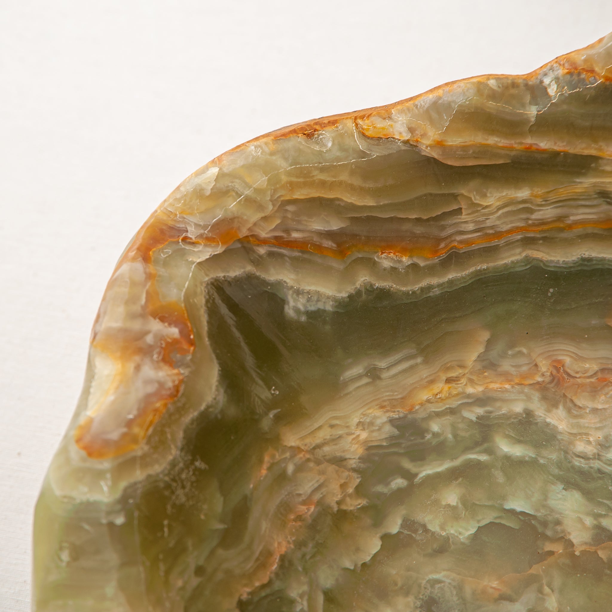 handcrafted onyx bowl with warm amber tones and natural veining for luxury table decor
