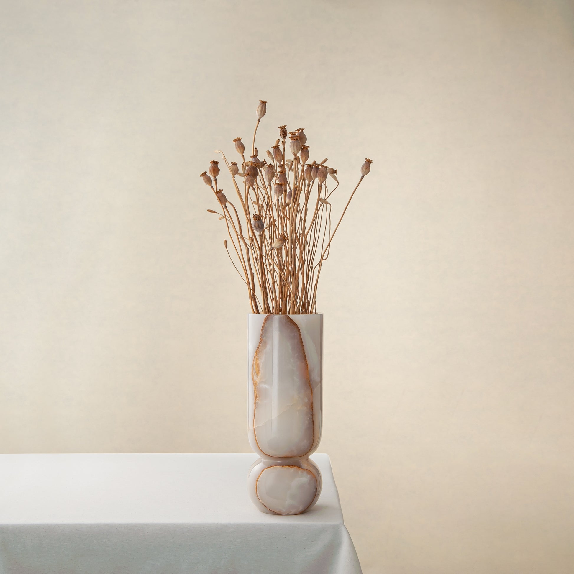 One-of-a-kind natural onyx vase with translucent stone layers and sculptural shape