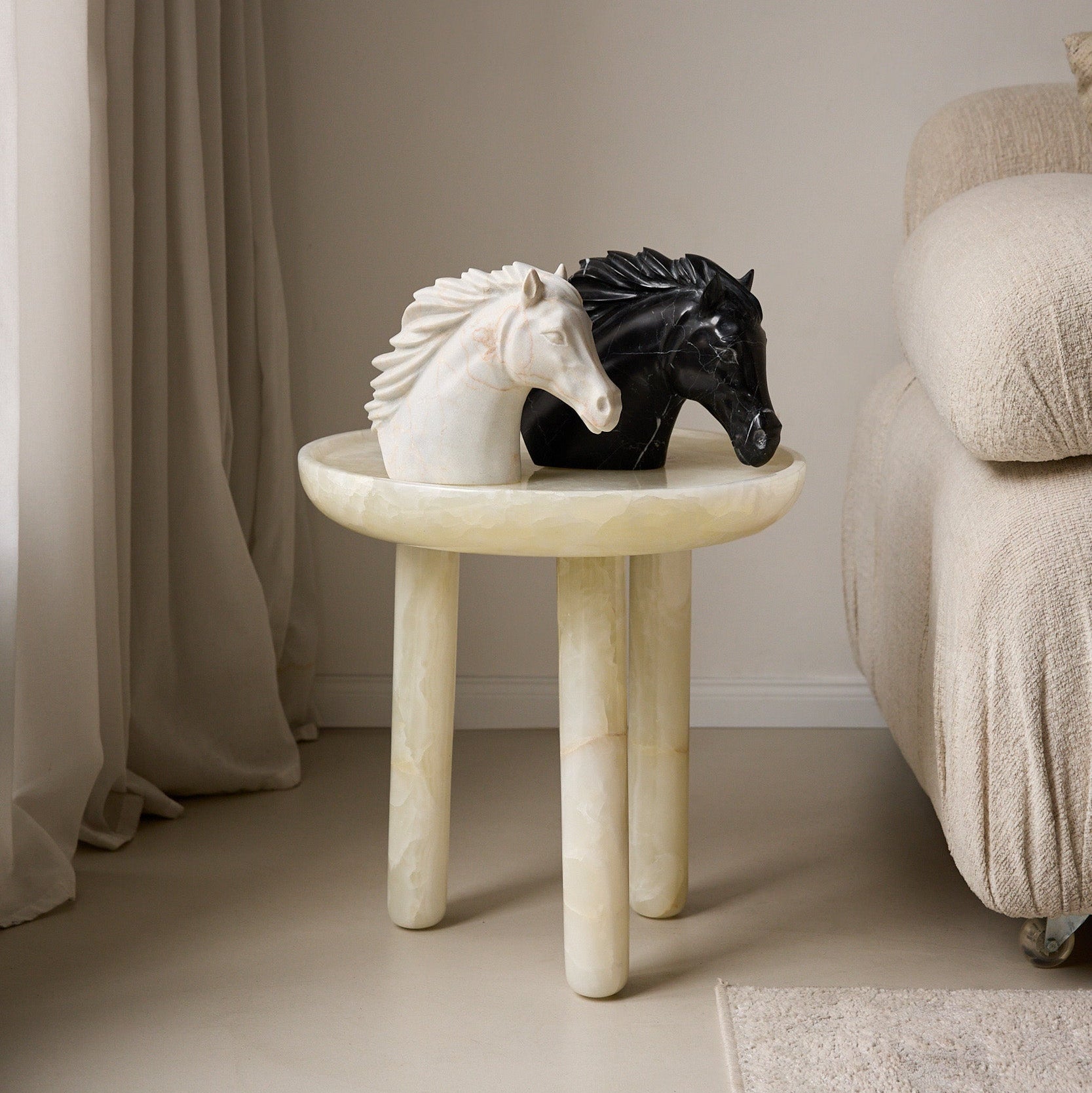 two very stone sculptures horse head by uniiqo studio