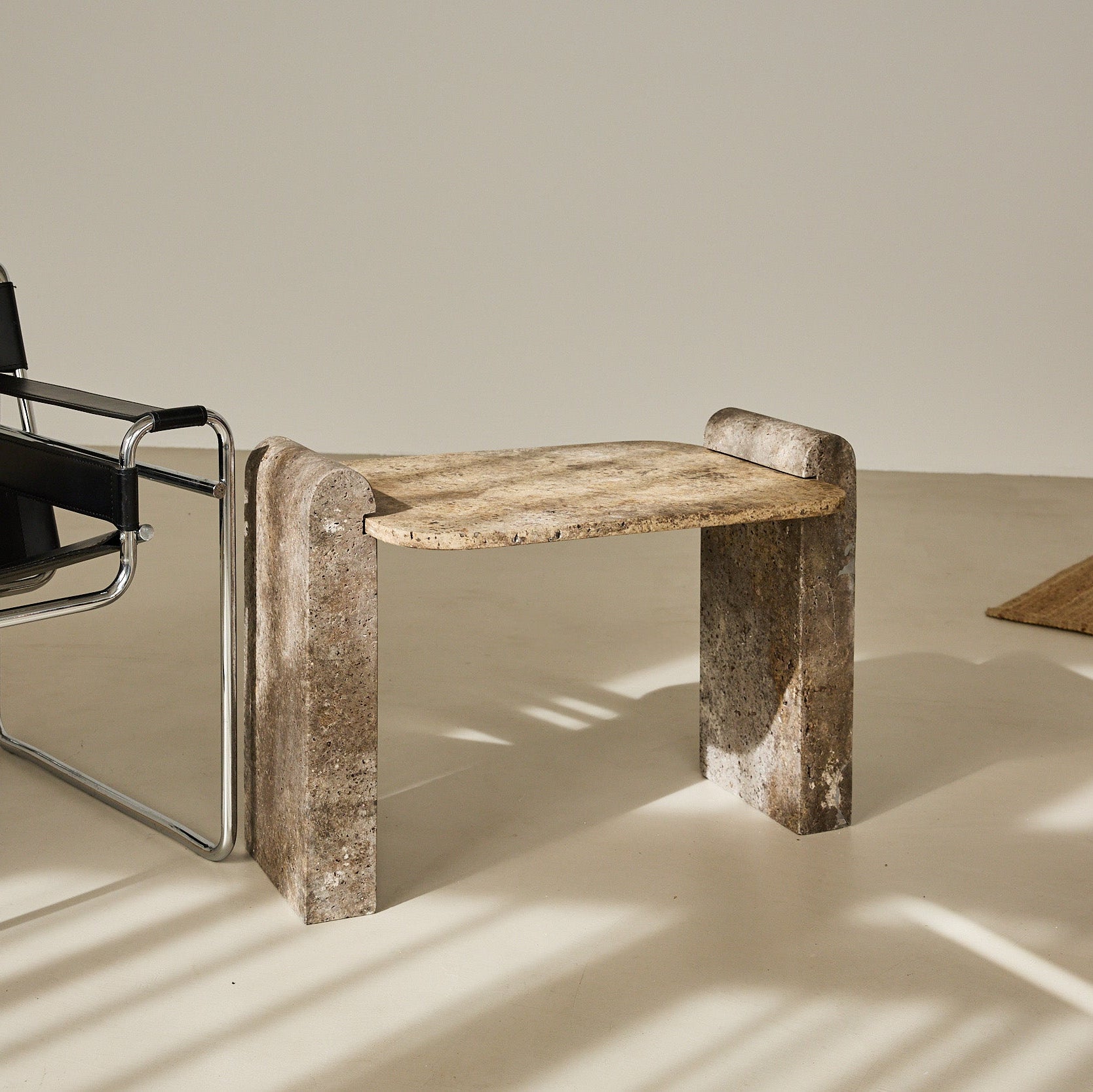 silver travertine side table handcrafted by Uniiqo Studio for minimalistic and modern interiors 