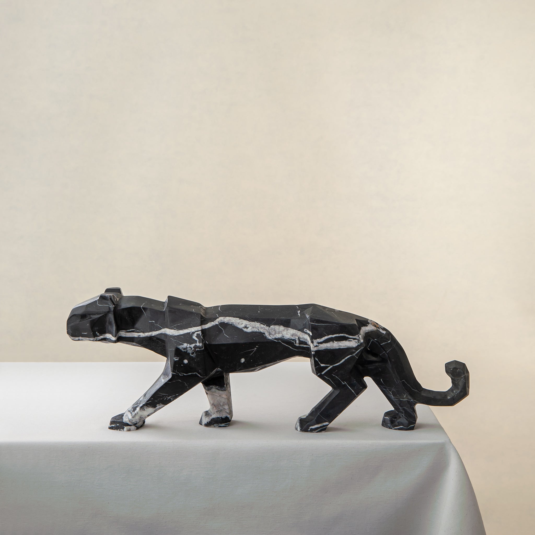 Vertex Panther Sculpture handcrafted from black marble with natural white veins Uniiqo Studio