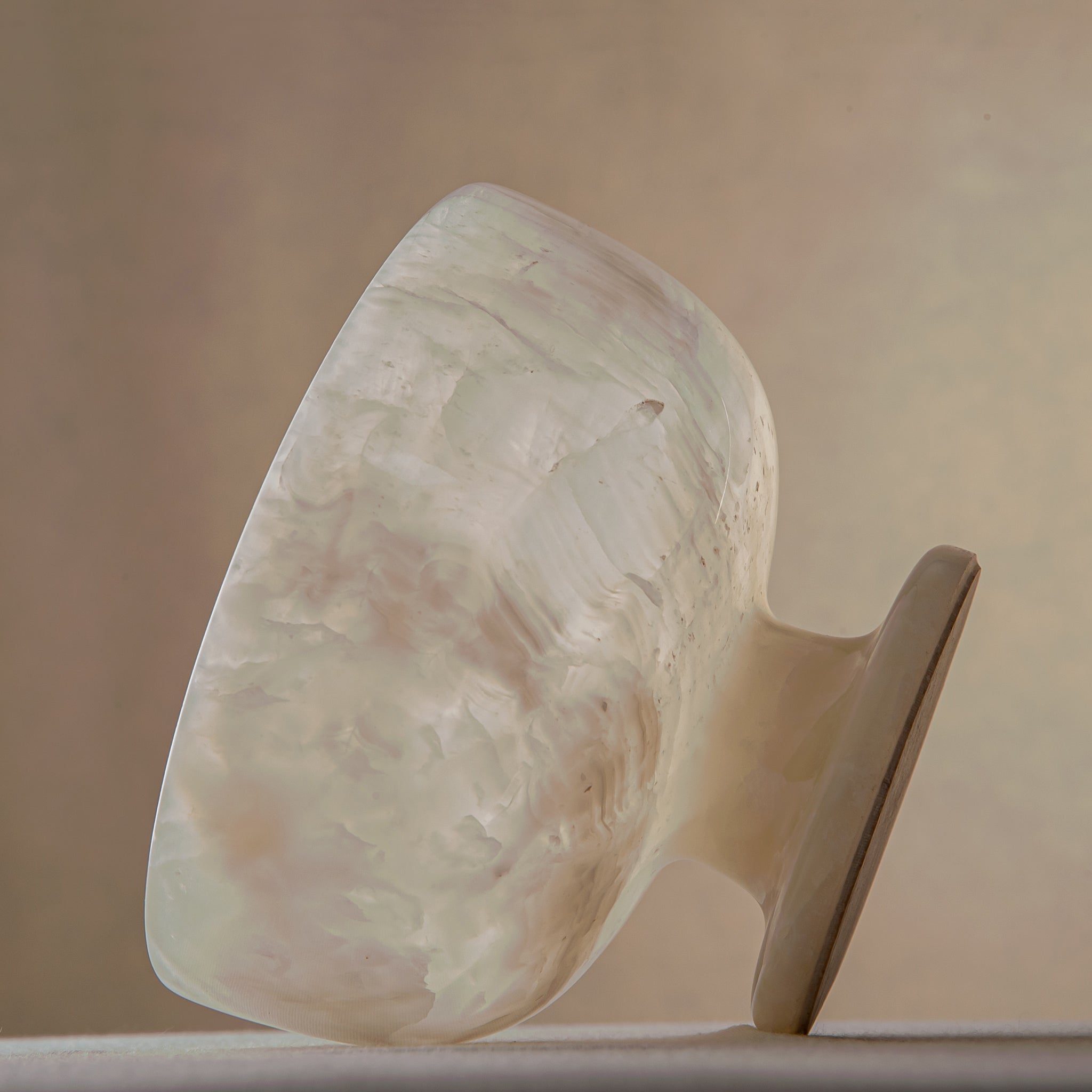 handcrafted alabaster pedestal bowl with translucent ivory stone and smooth polished surface
