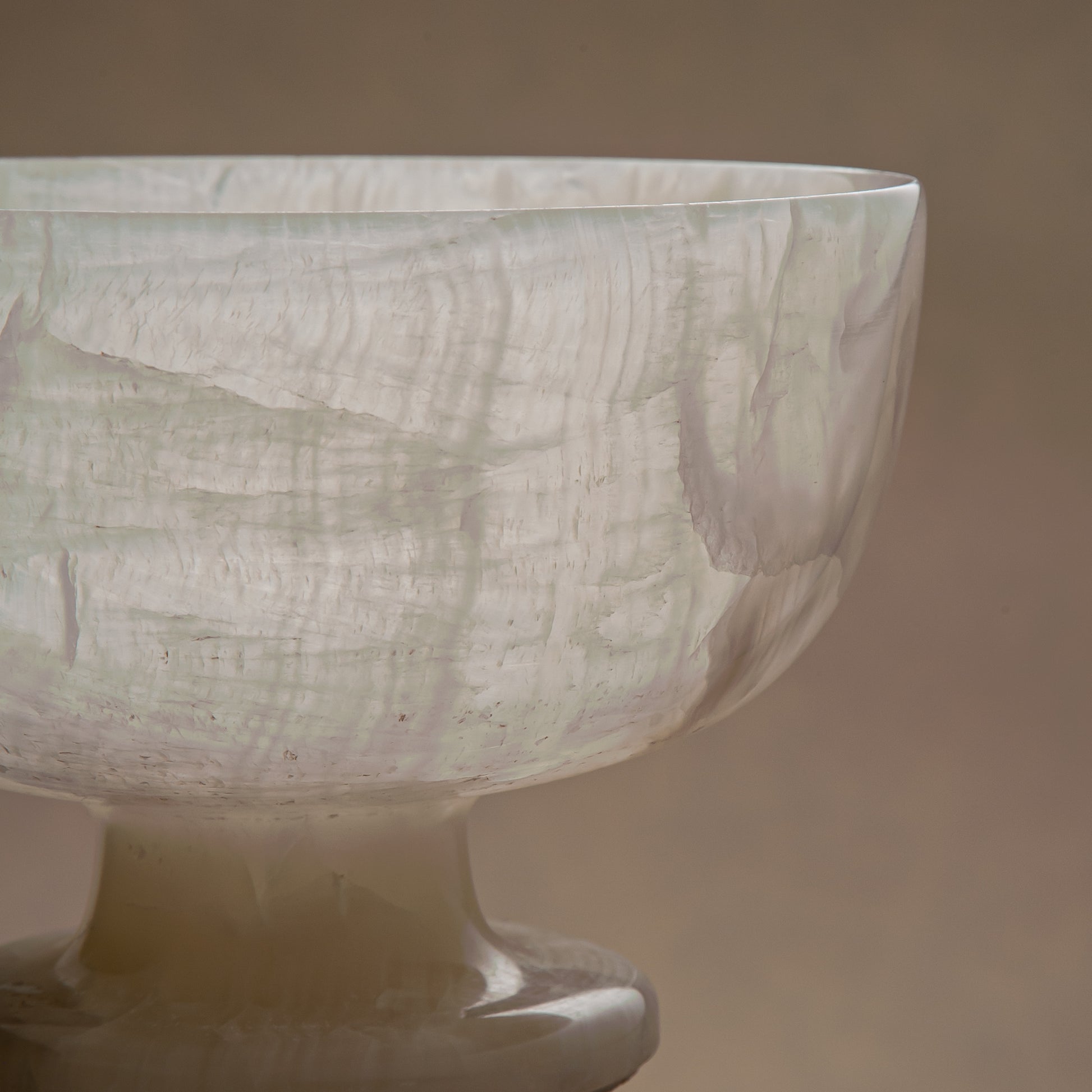 handcrafted alabaster pedestal bowl with translucent ivory stone and smooth polished surface
