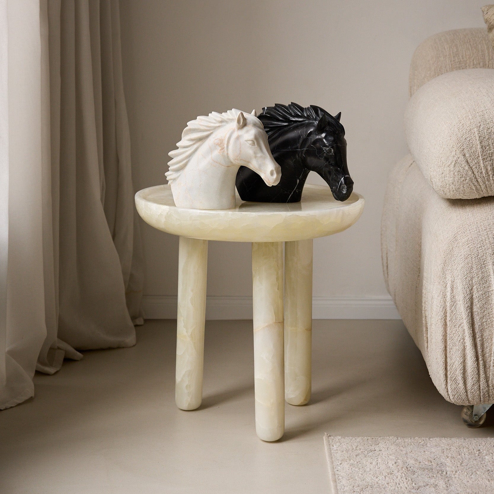 Unique handcrafted black marble horse sculpture with striking white veining
