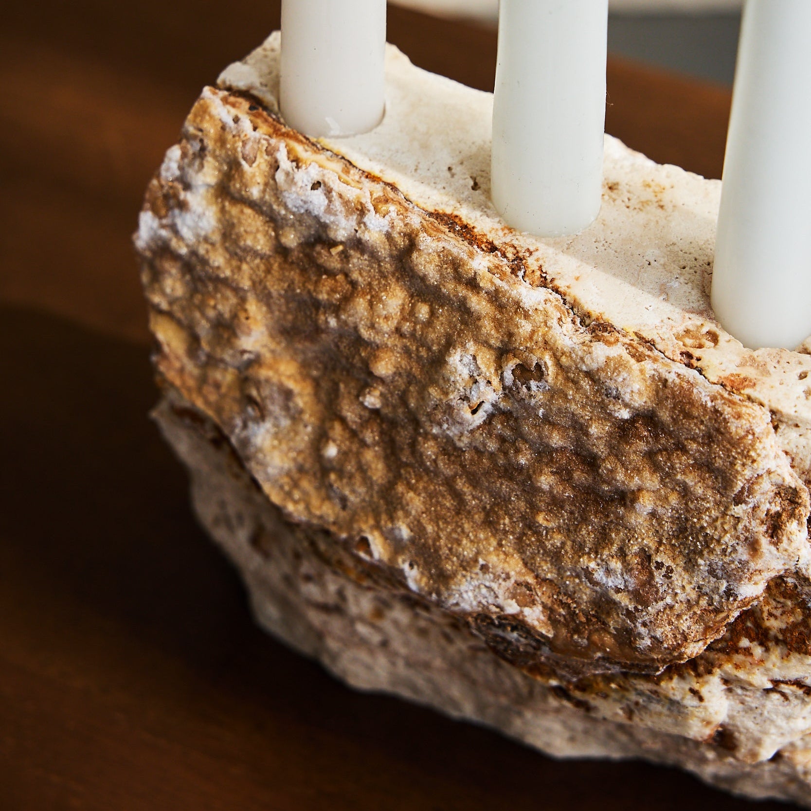 close up of travertine candle holder by Uniiqo Studio