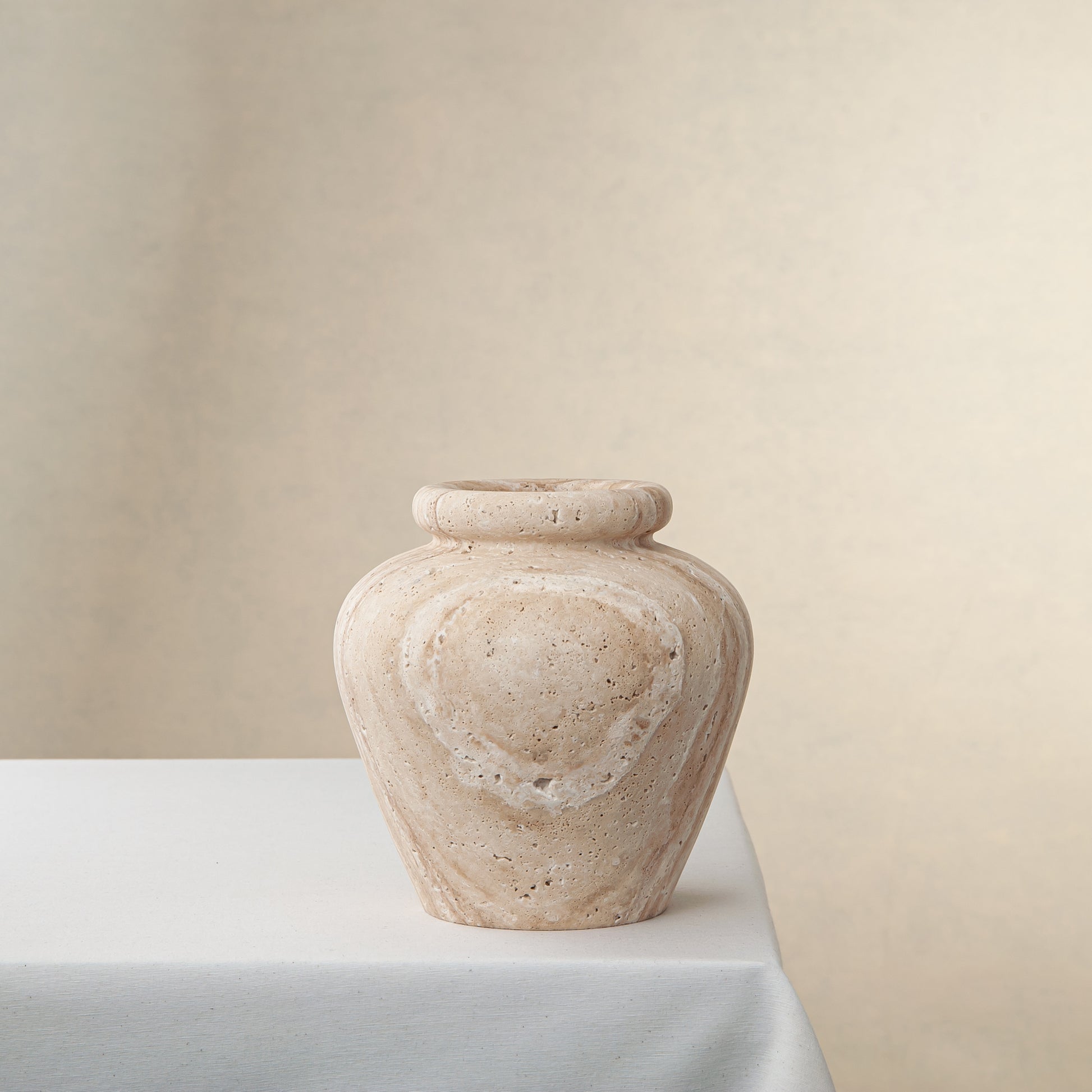 beige handcrafted travertine vase for minimalistic and modern homes Atelia Vase by Uniiqo Studio 