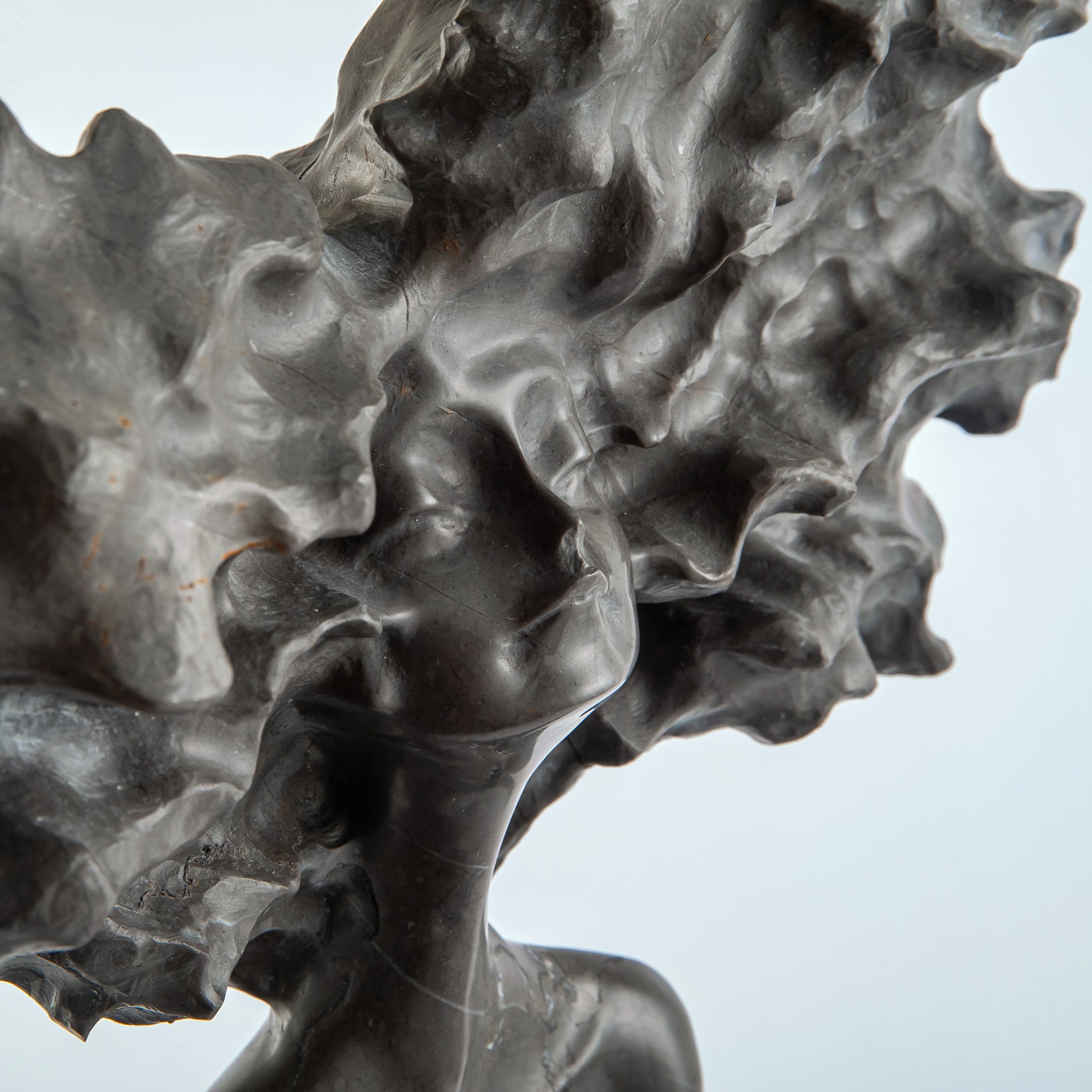 Reflective muse skulptur