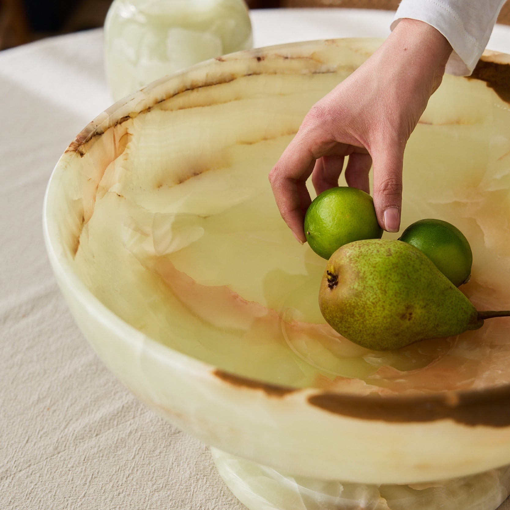 Large green onyx bowl with foot. For table decoration or home accessory.