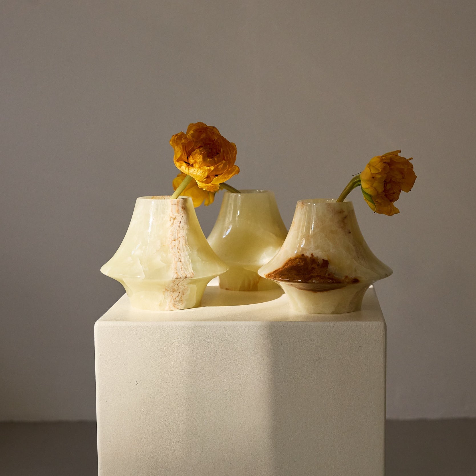 Three onyx vases 
