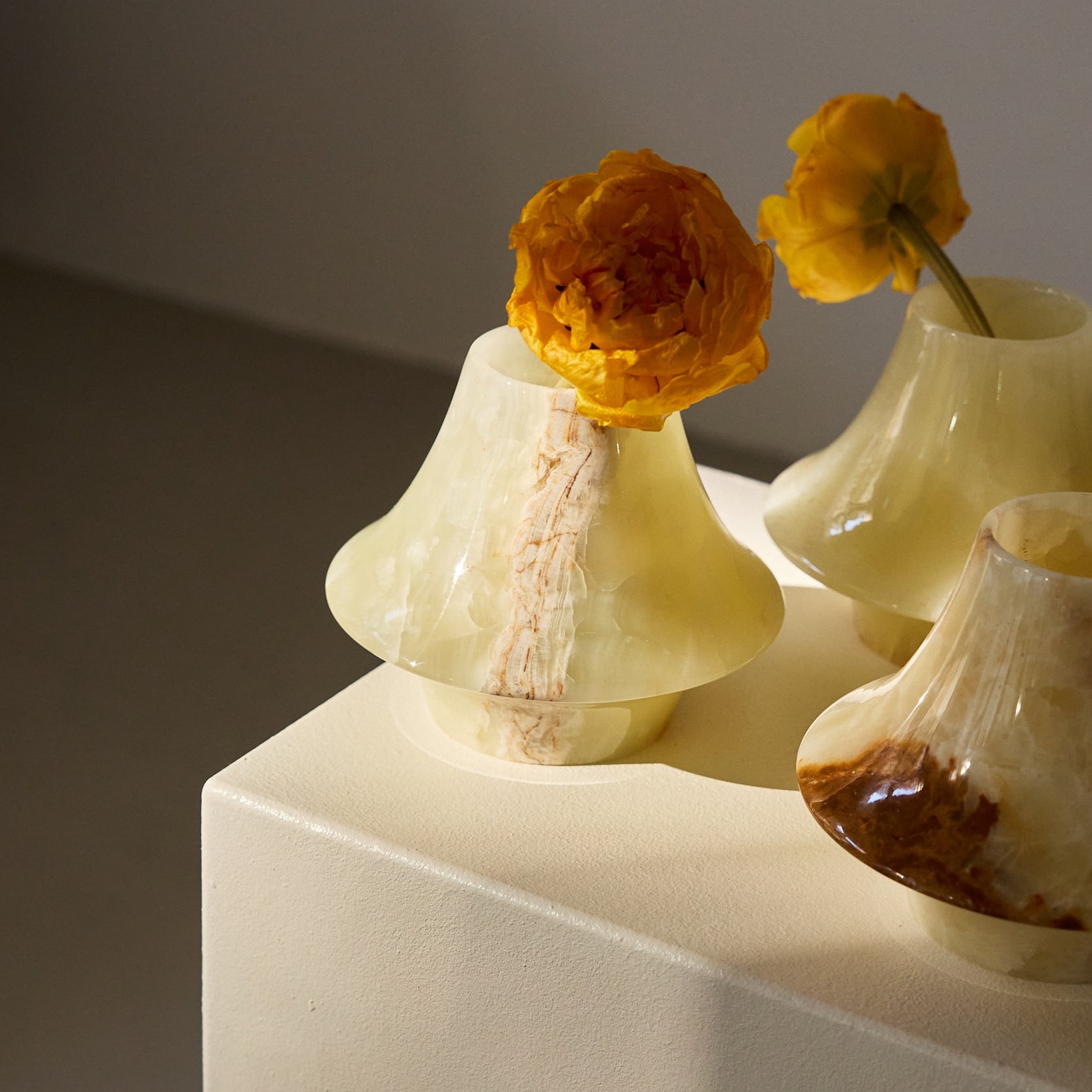 Handmade onyx vases in green with white veining