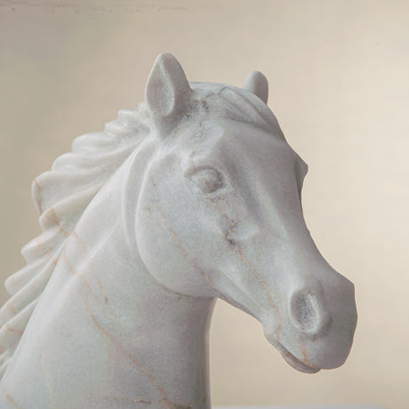 handcrafted marble horse sculpture with white stone and subtle warm veining for luxury decor

