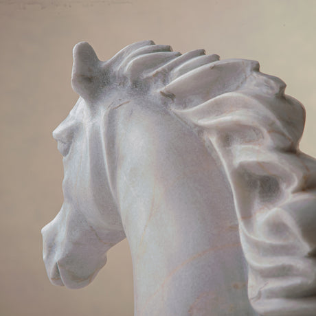 handcrafted marble horse sculpture with white stone and subtle warm veining for luxury decor
