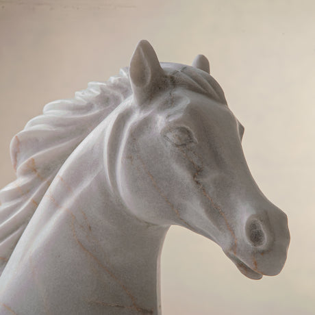handcrafted marble horse sculpture with white stone and subtle warm veining for luxury decor
