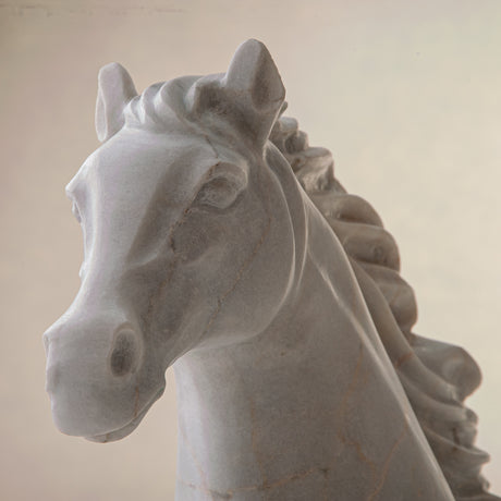 handcrafted marble horse sculpture with white stone and subtle warm veining for luxury decor
