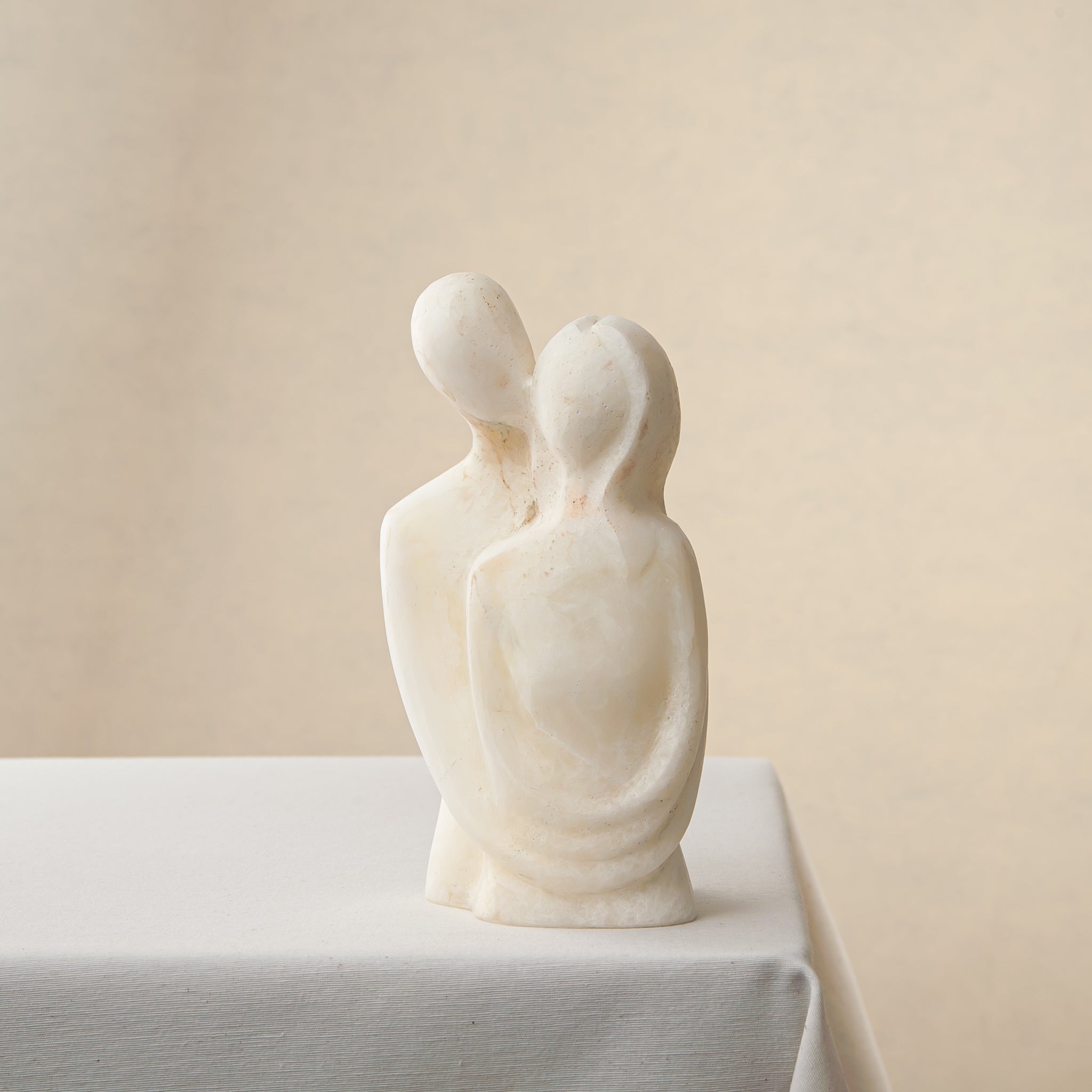 unique marble sculpture abstract dual figure soft ivory tone handcrafted decor object
