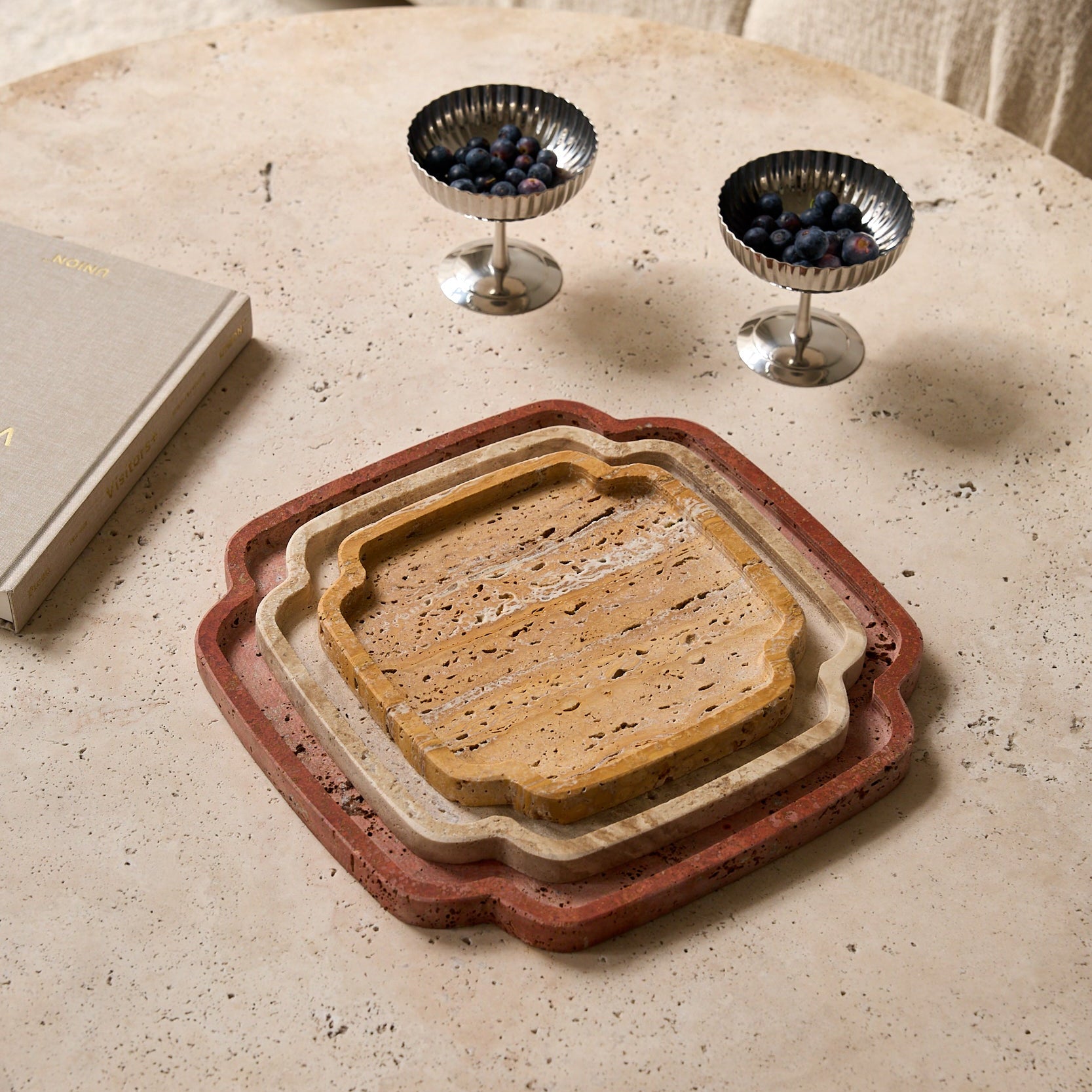 modern set of three travertine trazs bu Uniiqo Studio for elegant homes