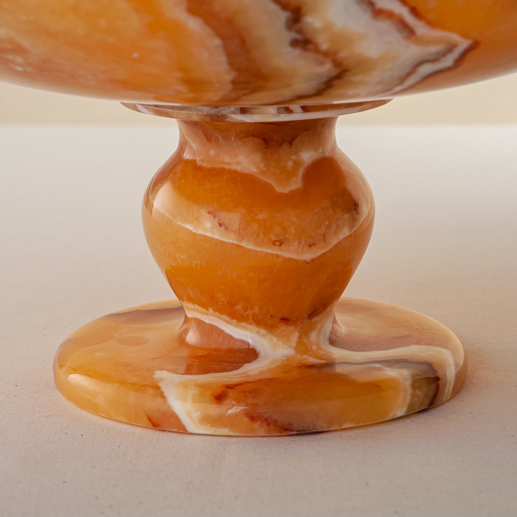 unique onyx bowl warm orange tones layered veining elegant decor
