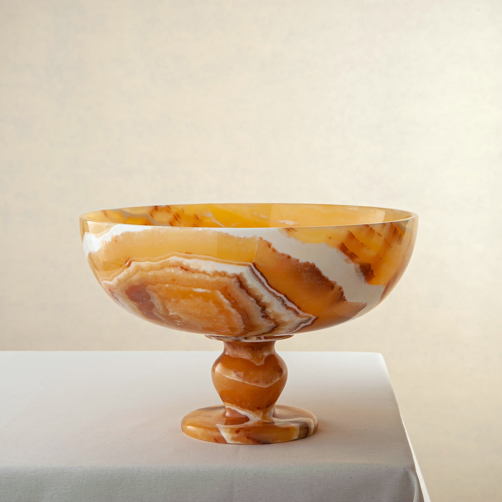 unique onyx bowl warm orange tones layered veining elegant decor
