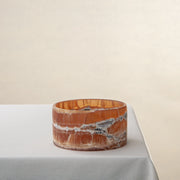 handcrafted onyx bowl with warm amber tones and natural veining for luxury table decor
