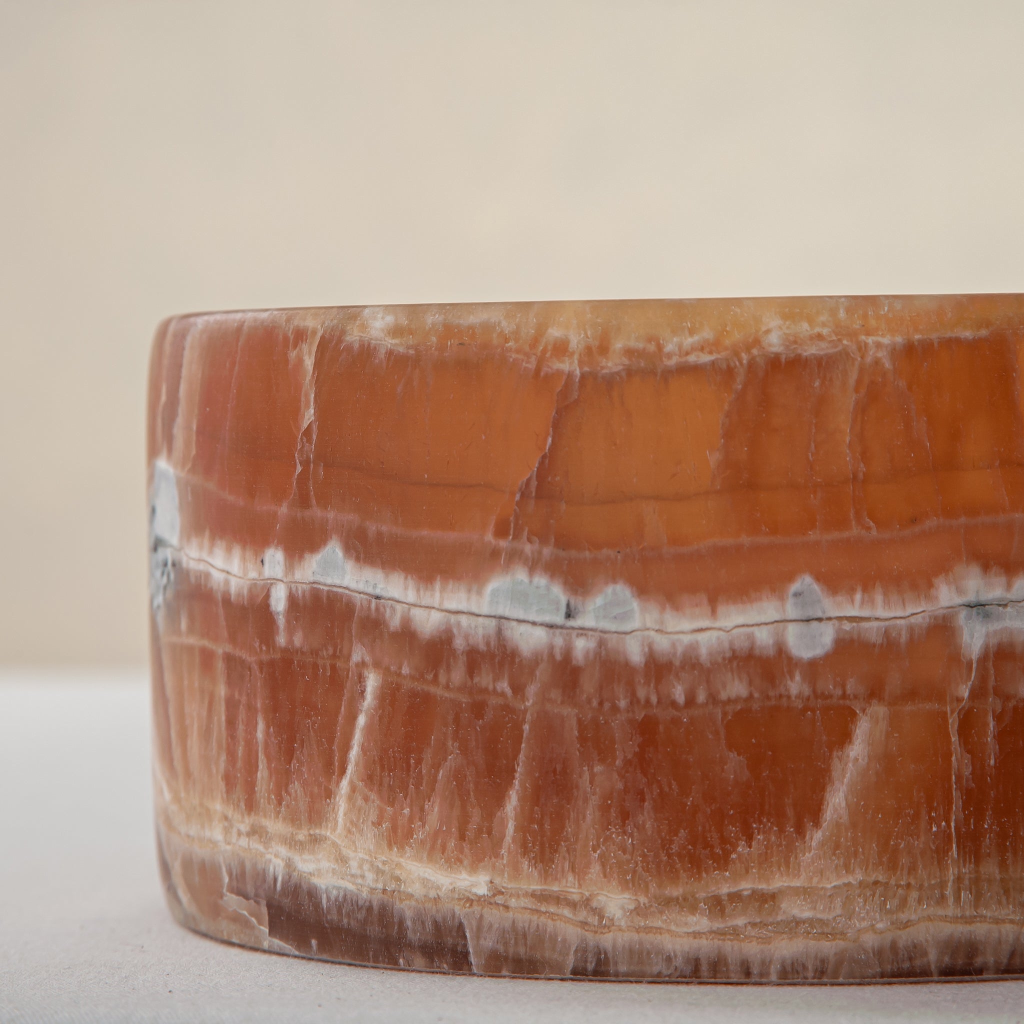 handcrafted onyx bowl with warm amber tones and natural veining for luxury table decor
