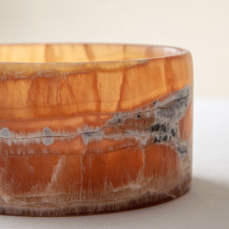handcrafted onyx bowl with warm amber tones and natural veining for luxury table decor
