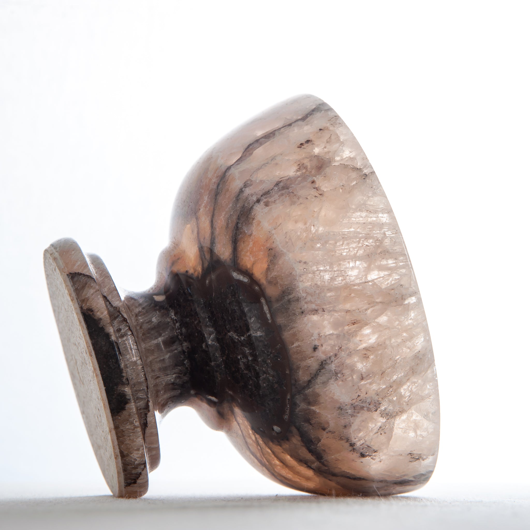 natural stone onyx bowl with warm hues and organic veining for modern interior styling
