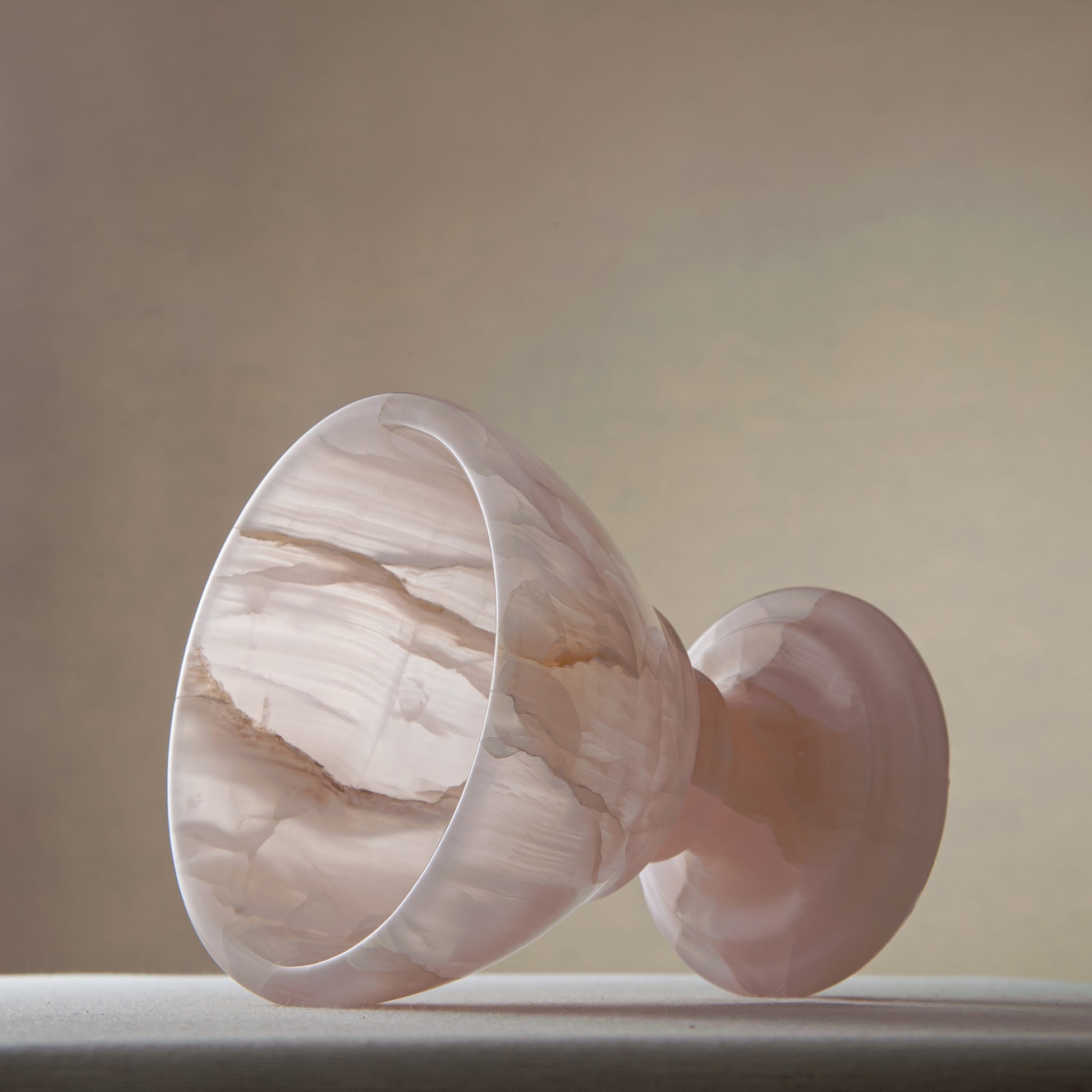 handcrafted onyx bowl blush pink translucent stone elegant pedestal design
