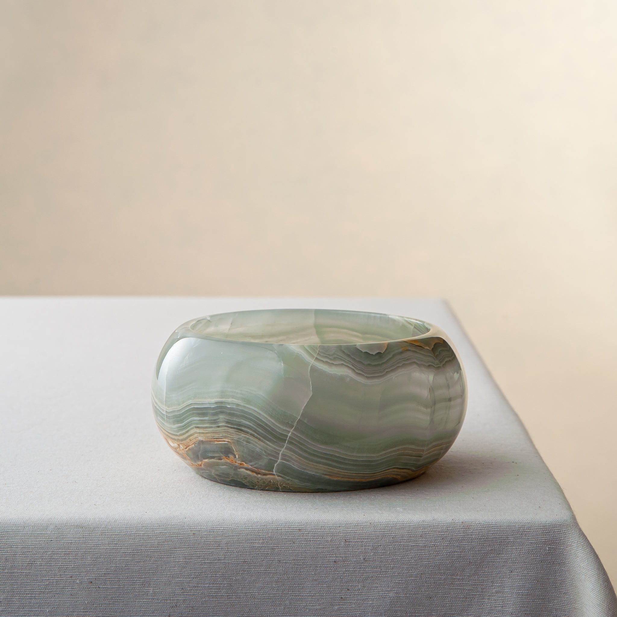 Handcrafted green onyx bowl with layered banding unique decorative centerpiece
