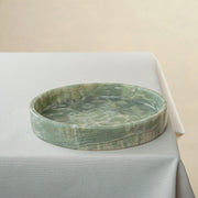 handcrafted onyx bowl with soft green tones and delicate white veining for elegant table decor
