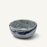 Marble-patterned ceramic bowl on a white background