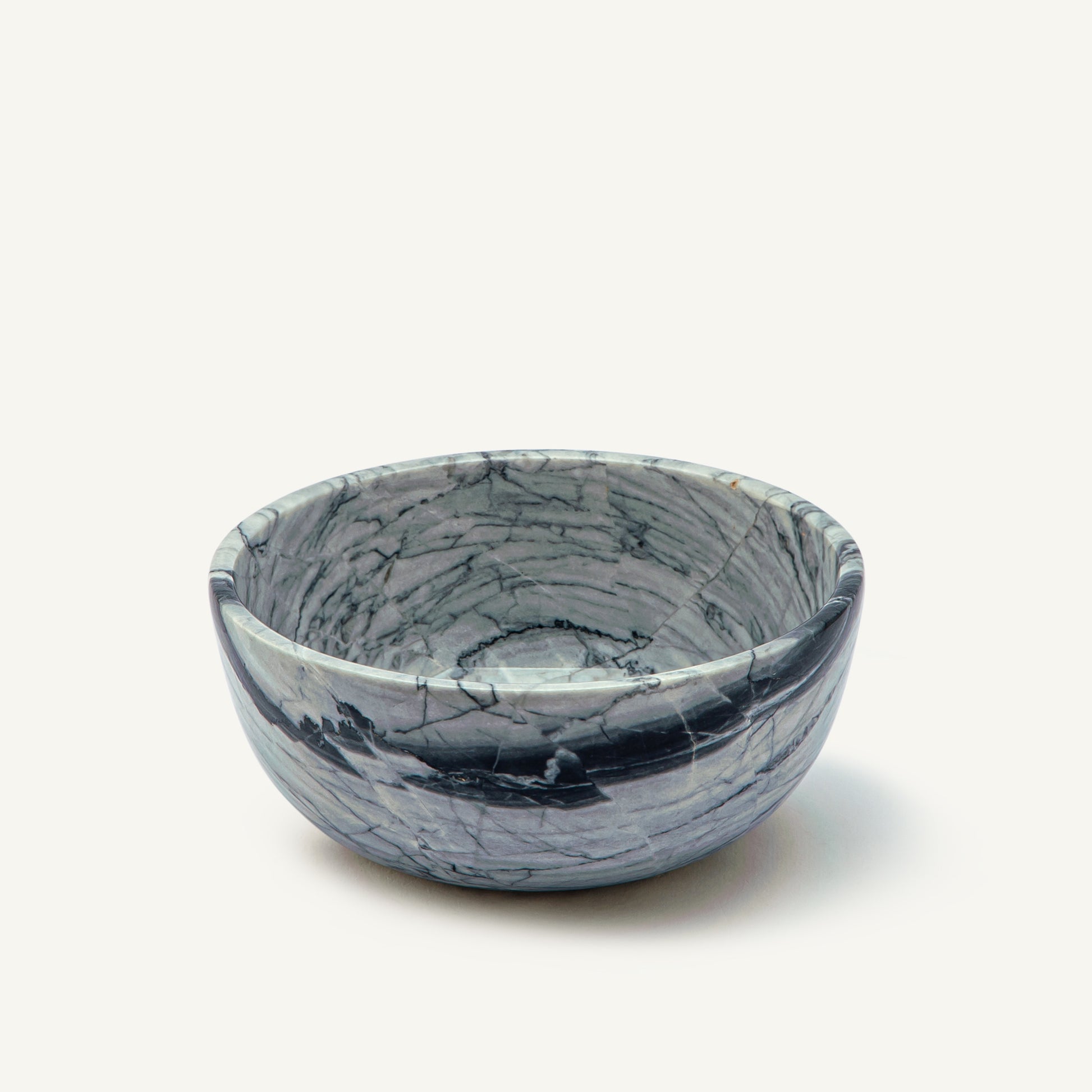 Marble-patterned ceramic bowl on a white background