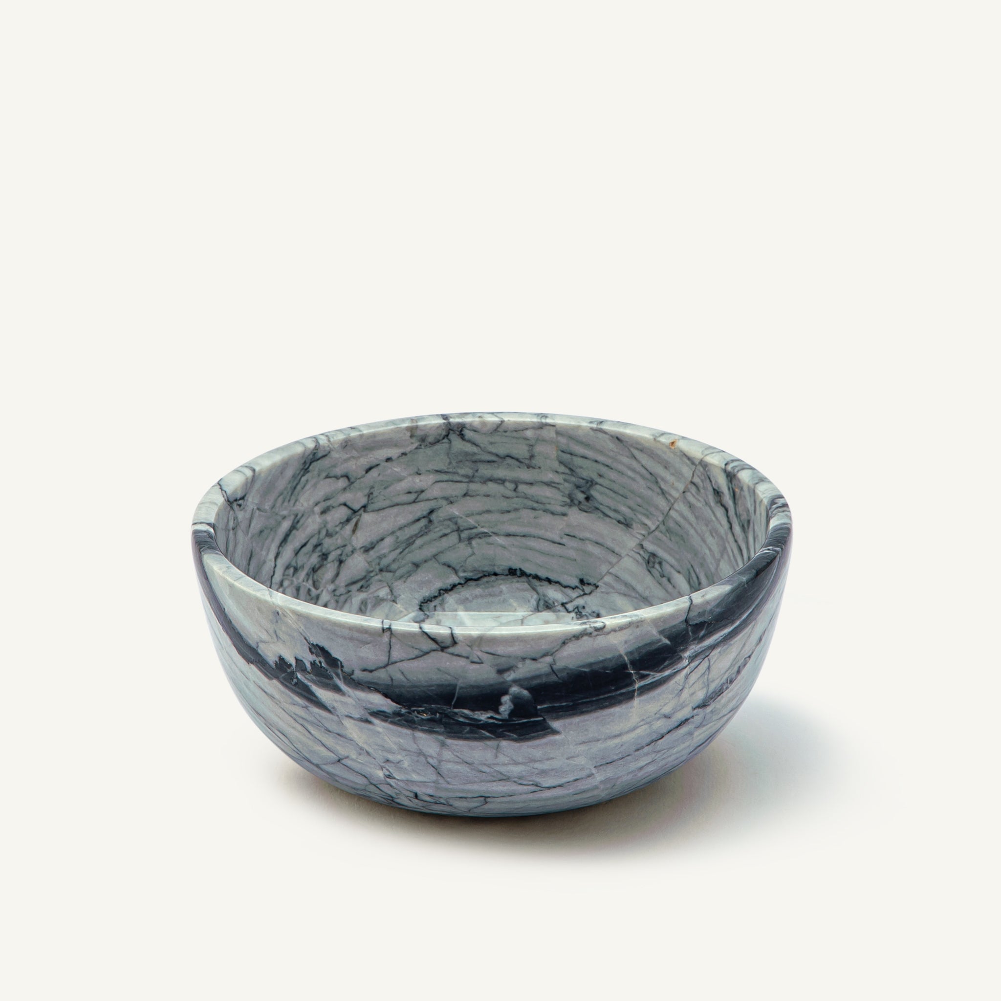 Marble-patterned ceramic bowl on a white background