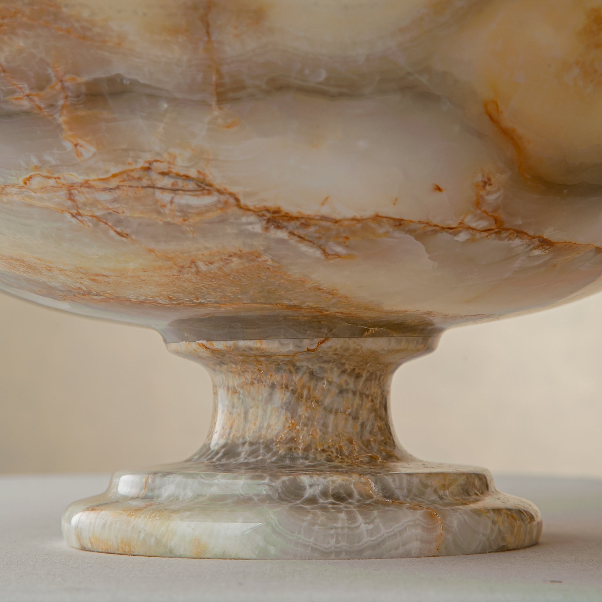 handcrafted onyx bowl with honey and ivory veining and translucent layered texture for luxury decor
