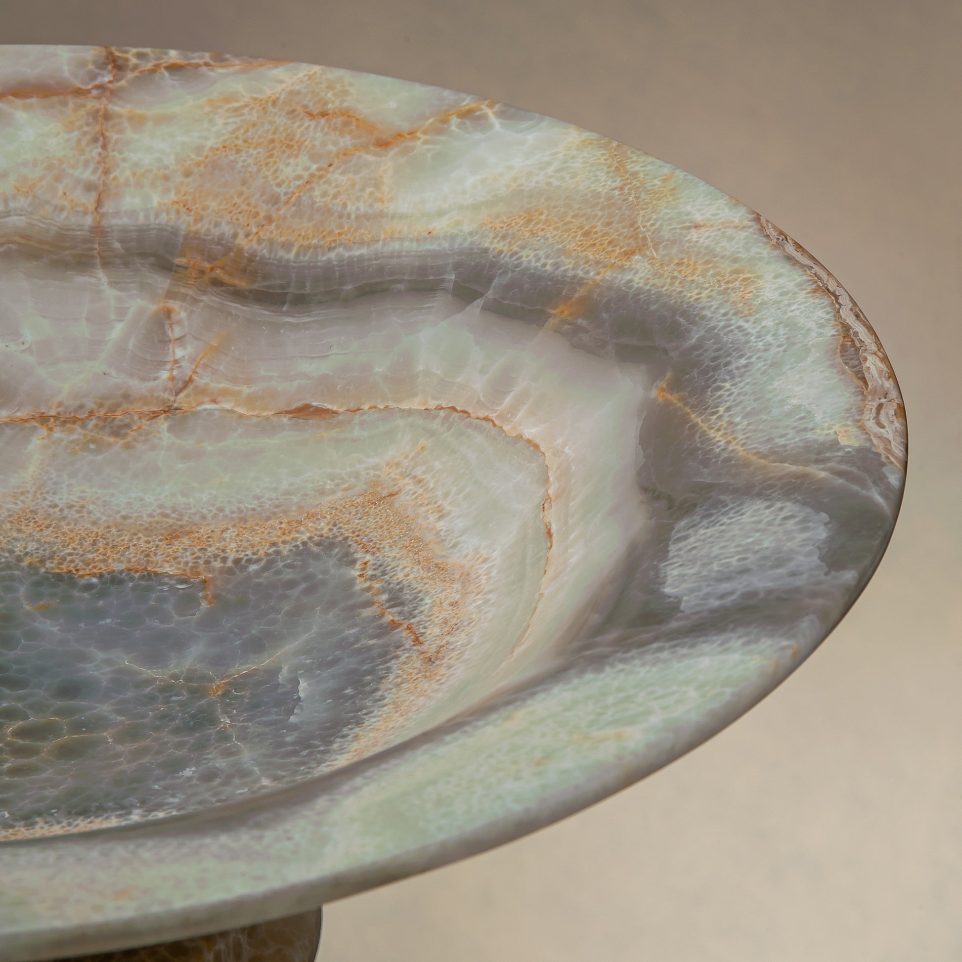 handcrafted onyx bowl with honey and ivory veining and translucent layered texture for luxury decor
