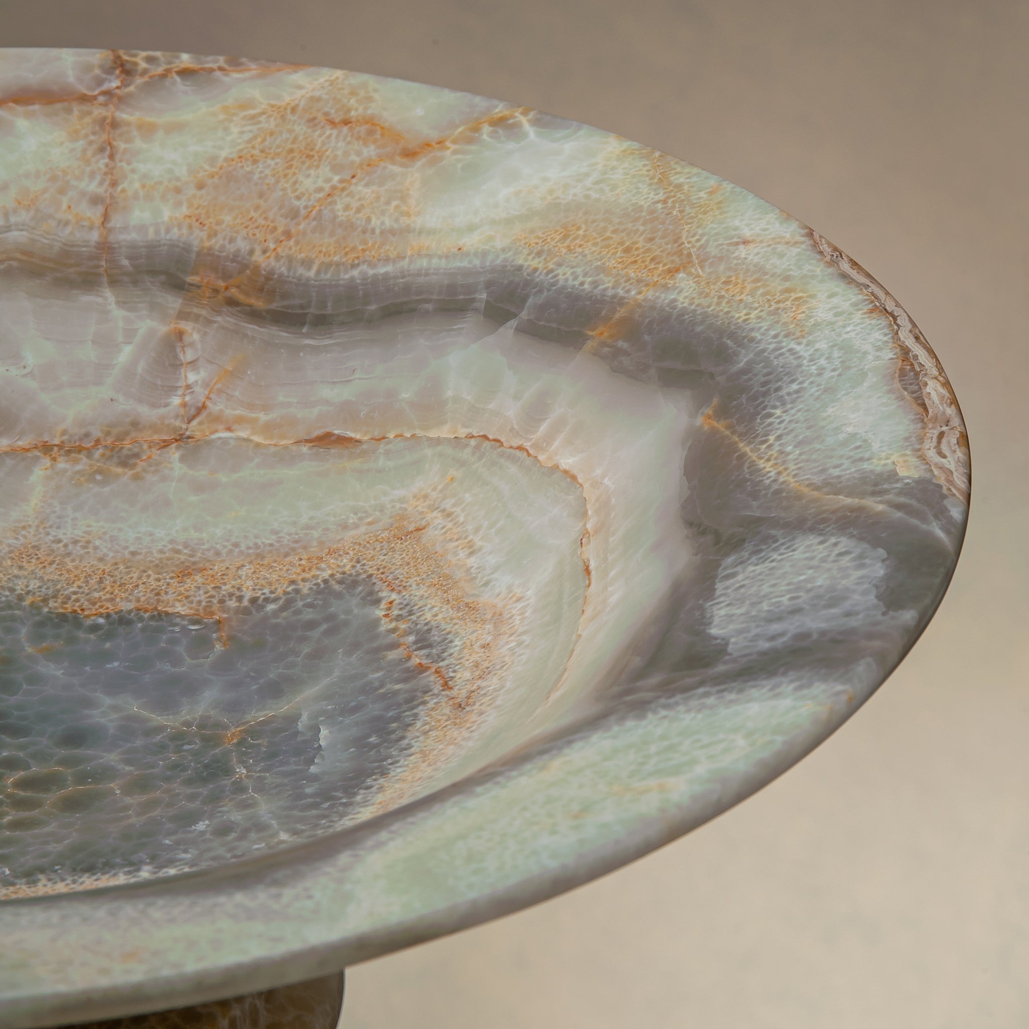 handcrafted onyx bowl with honey and ivory veining and translucent layered texture for luxury decor
