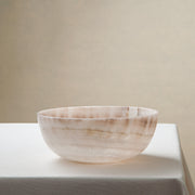 handcrafted onyx bowl with ivory and blush beige tones and soft translucent layers for elegant decor
