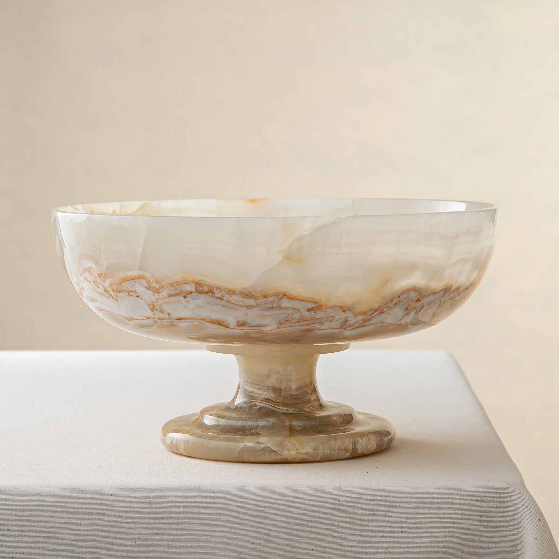 handcrafted onyx bowl with ivory tones and soft translucent layers for elegant decor
