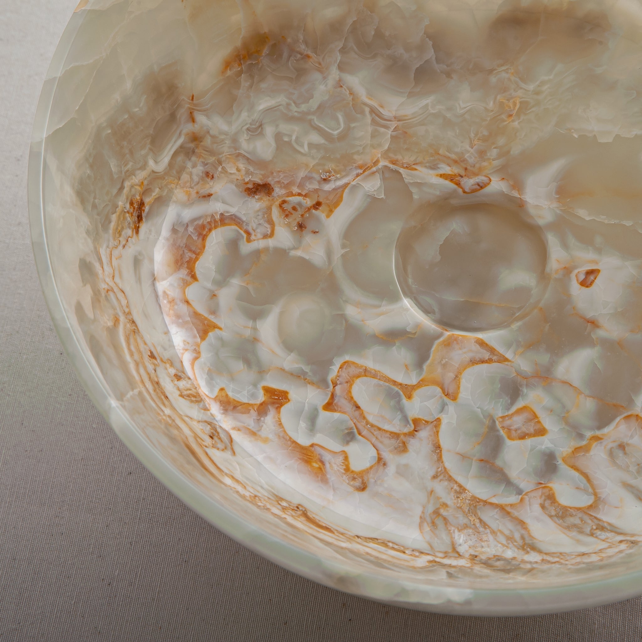handcrafted onyx bowl with ivory tones and soft translucent layers for elegant decor
