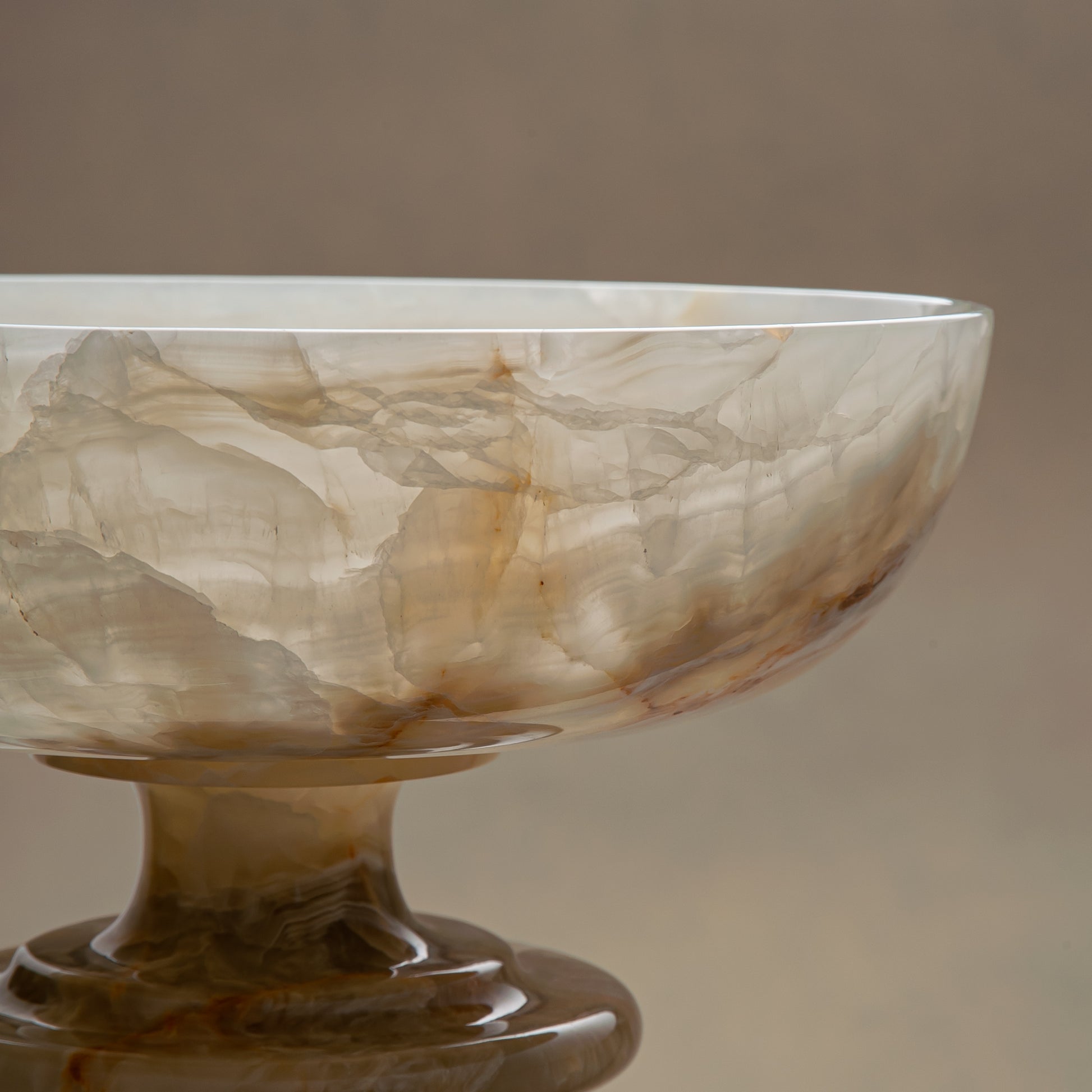 handcrafted onyx bowl with ivory tones and soft translucent layers for elegant decor
