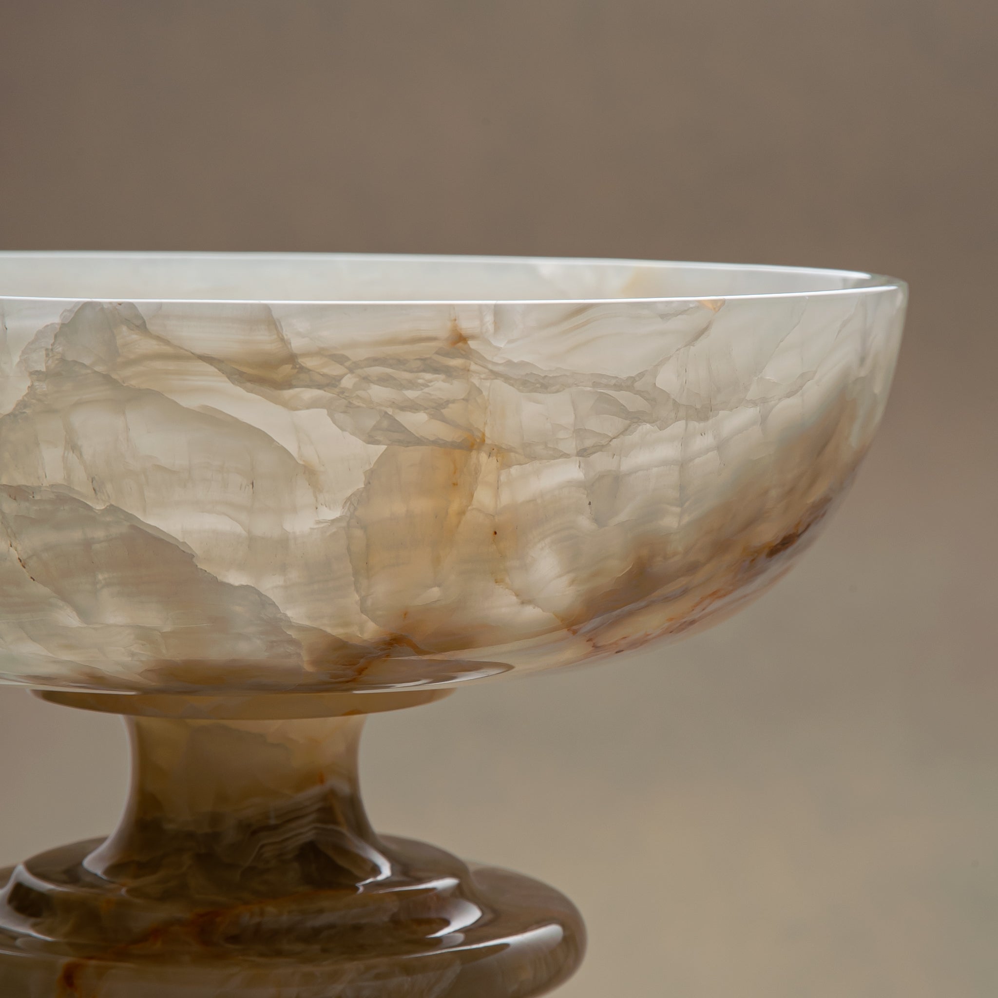 handcrafted onyx bowl with ivory tones and soft translucent layers for elegant decor
