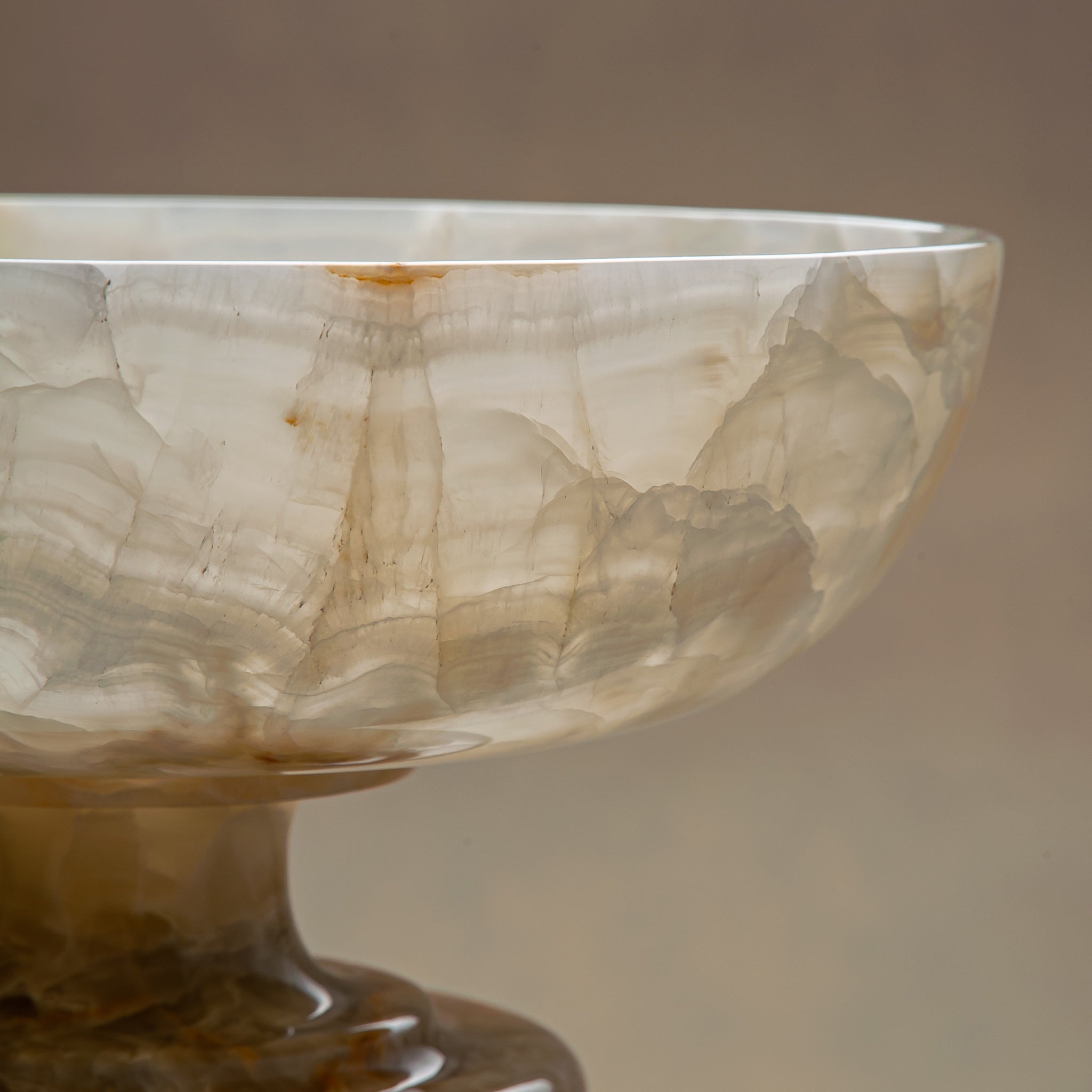 handcrafted onyx bowl with ivory tones and soft translucent layers for elegant decor
