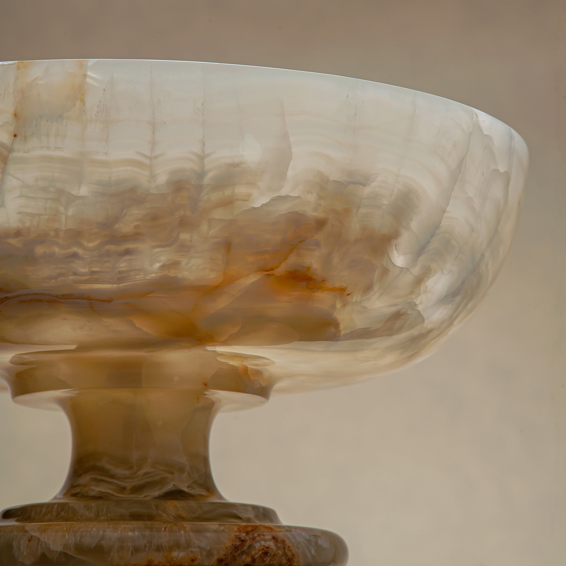 handcrafted onyx bowl with ivory tones and soft translucent layers for elegant decor
