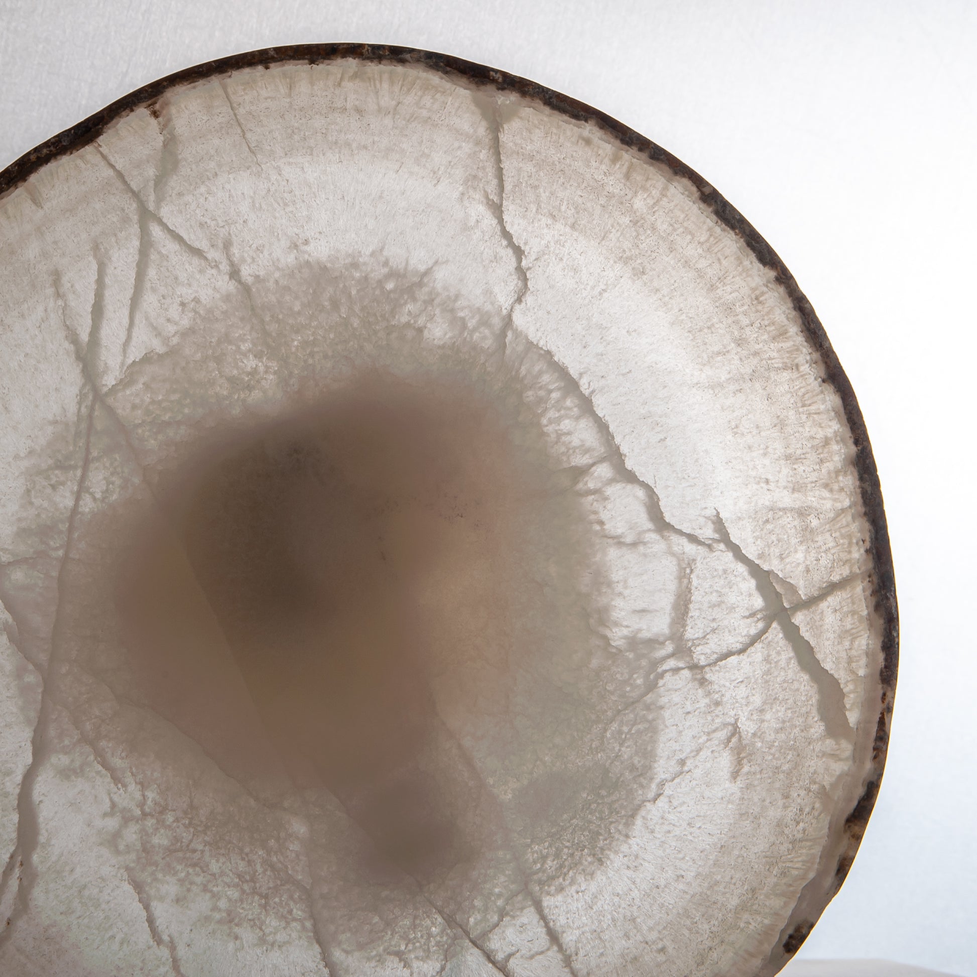 handcrafted onyx bowl in translucent ivory stone with natural rugged edge for luxury decor
