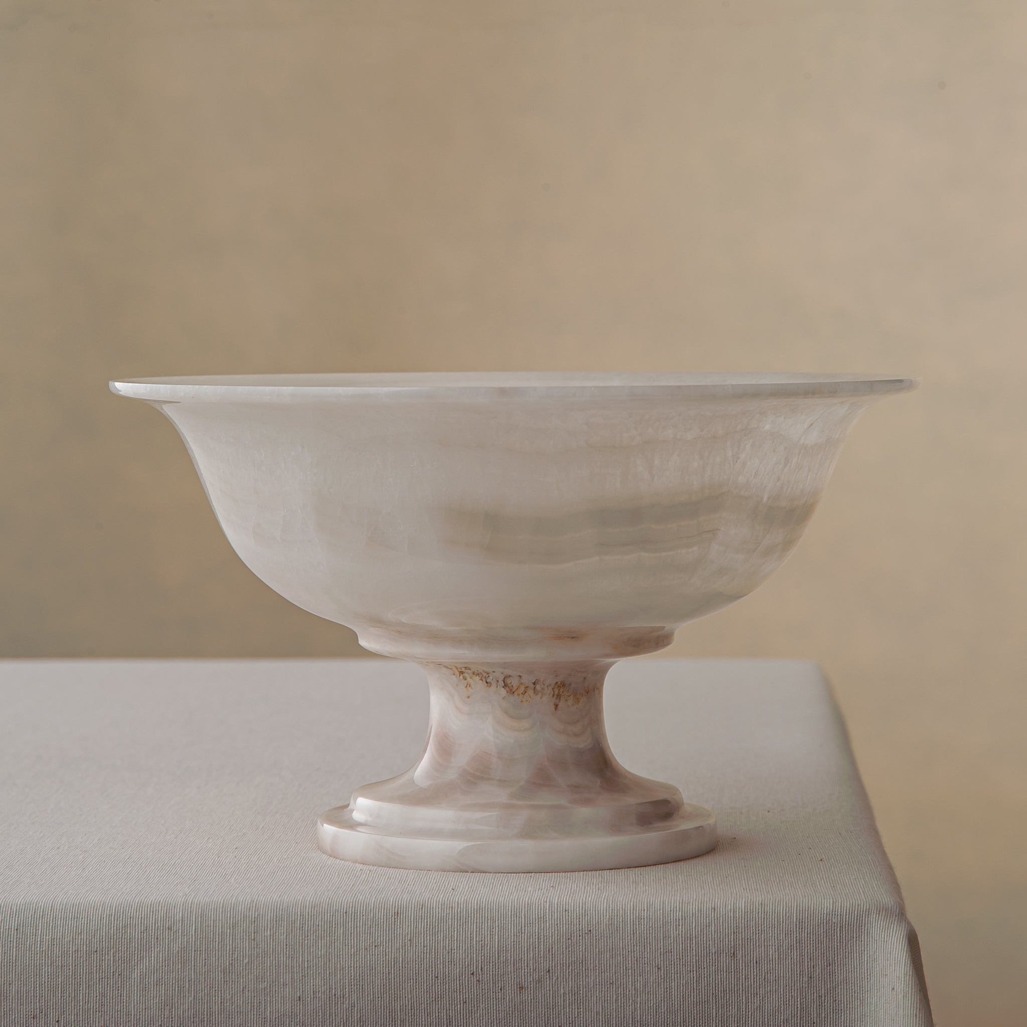 handcrafted onyx bowl with milky translucency and soft blush veining for luxury decor

