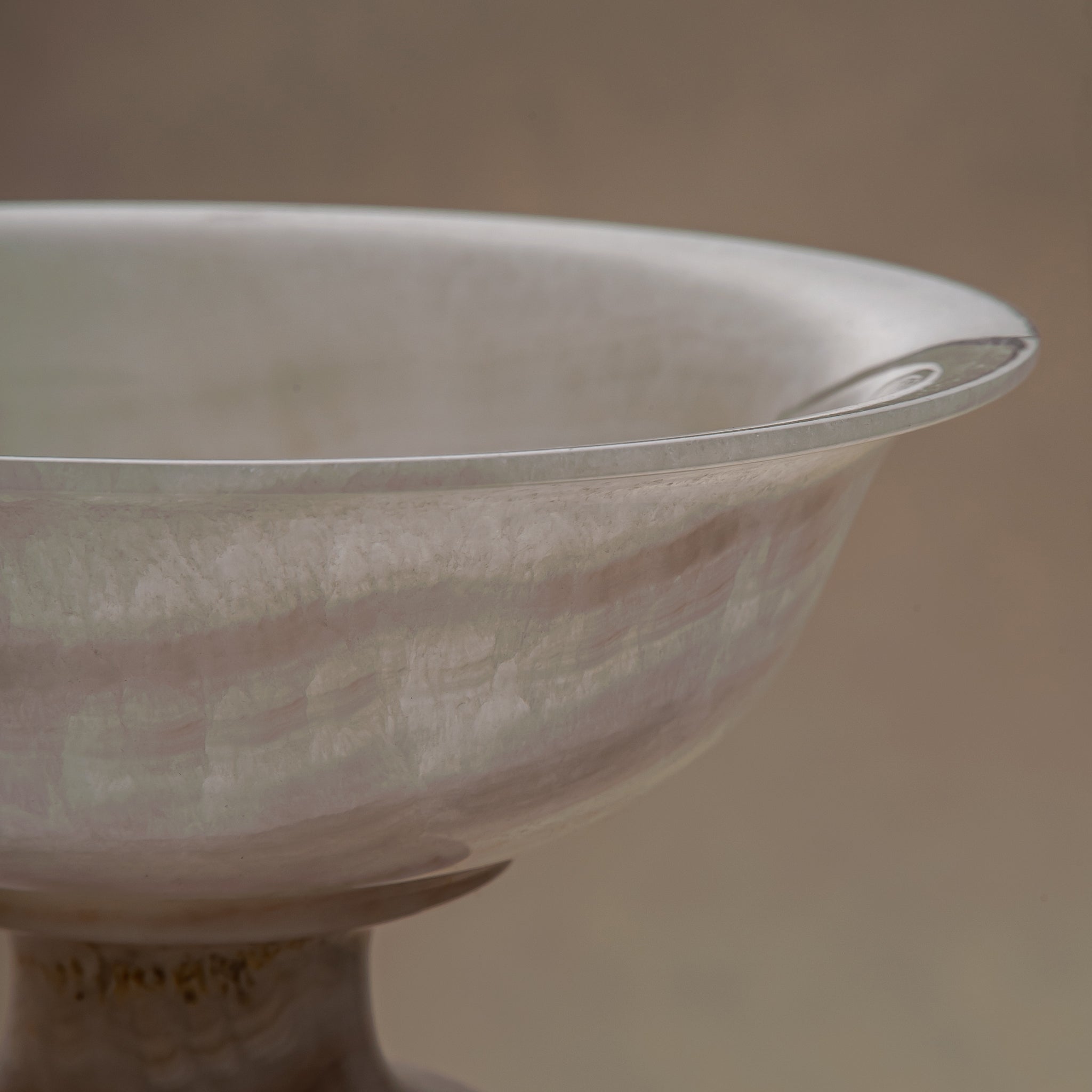 handcrafted onyx bowl with milky translucency and soft blush veining for luxury decor
