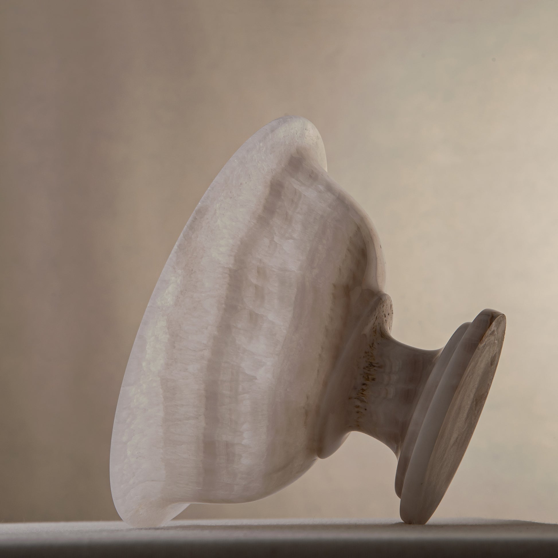 handcrafted onyx bowl with milky translucency and soft blush veining for luxury decor

