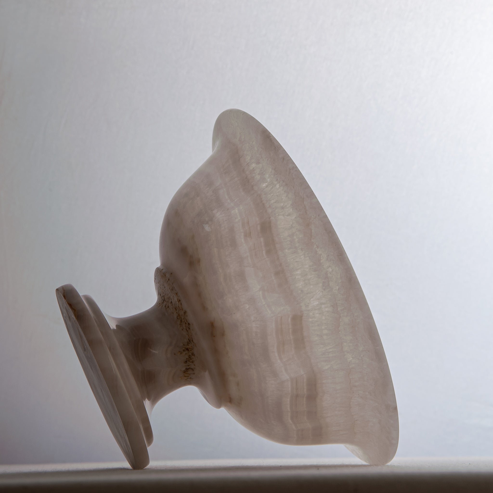 handcrafted onyx bowl with milky translucency and soft blush veining for luxury decor
