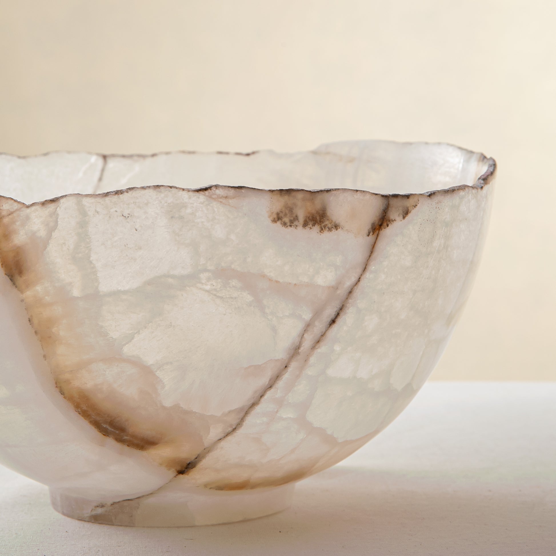 handcrafted onyx bowl with milky translucency and subtle warm veining for luxury decor
